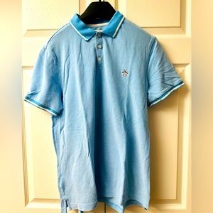 Like new three-bottom polo shirt. Size Large.